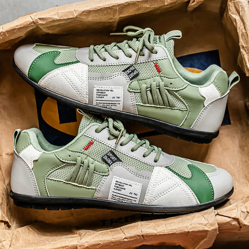 Retro sneakers in a box: white and light green with green lace-up style