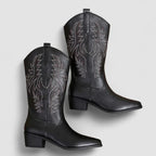 Black orthopedic western boots with leaf-embroidered uppers and square toe