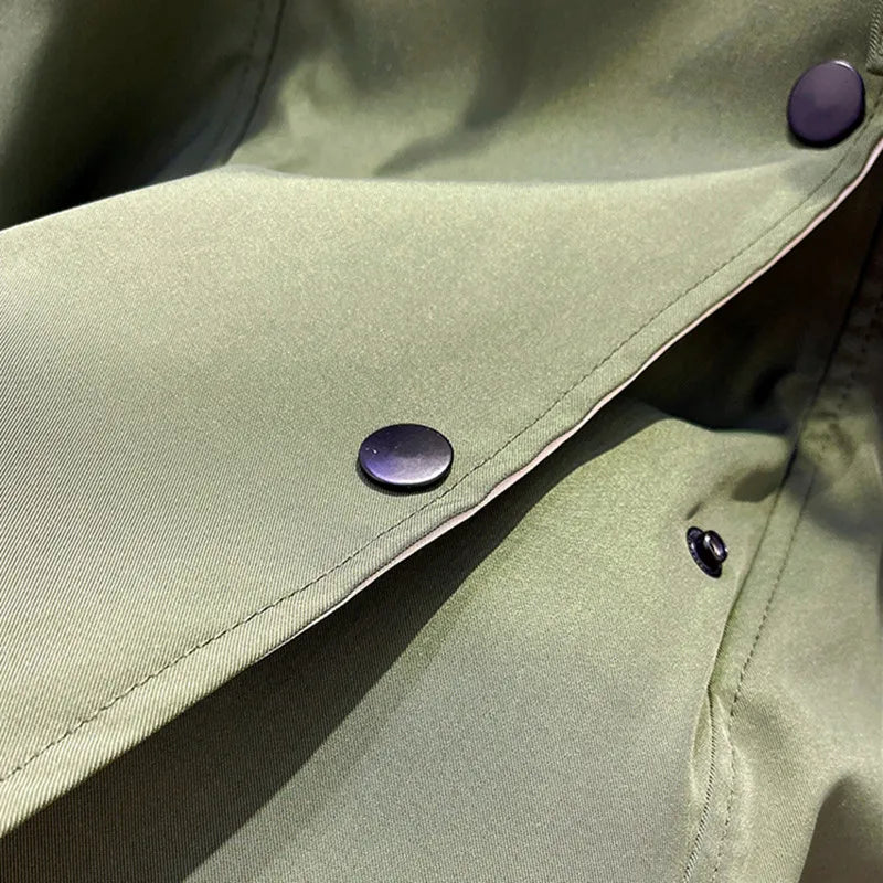 Olive windbreaker fabric with two-tone metal snaps on the front flap