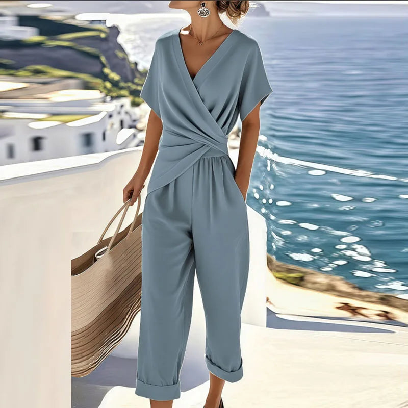 Blue wrap V-neck short-sleeve two-piece set with wide-leg pants and belted waist