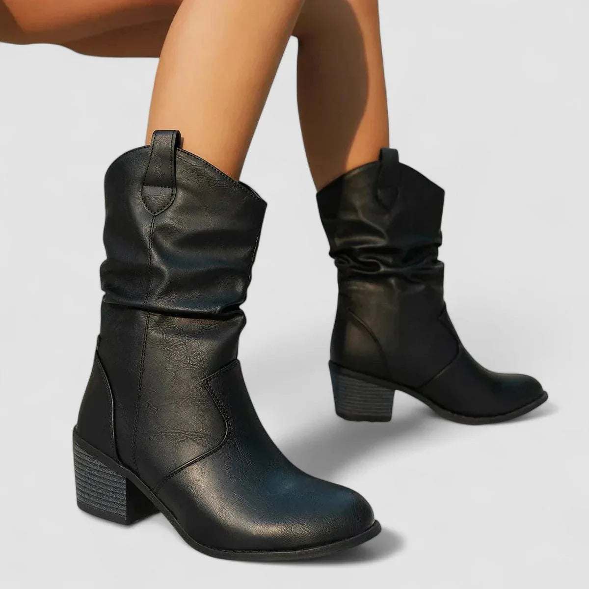 Black leather orthopedic ankle boots with ruched shaft and chunky block heel