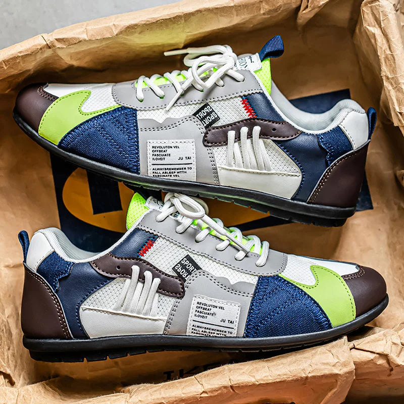 Retro sneakers in a box: white, navy blue, green and brown with white laces