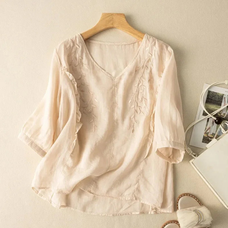 Cream cotton-linen loose top with embroidered leaf accents and short sleeves