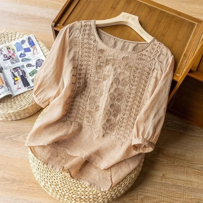 Beige embroidered blouse, round neck, three-quarter sleeves, vertical textured front panel