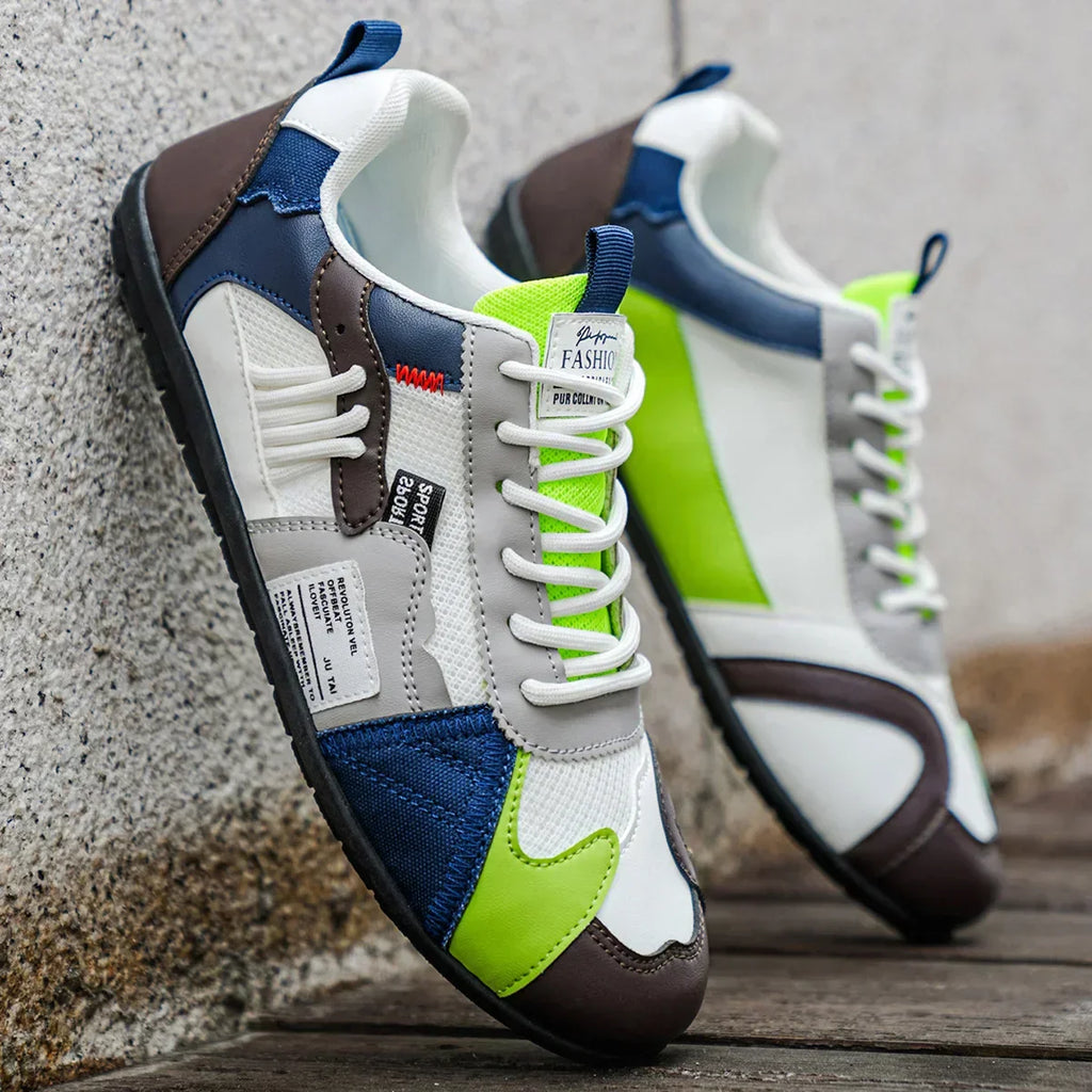 Colorful retro sneakers close-up: white, blue and neon green with white lace-up