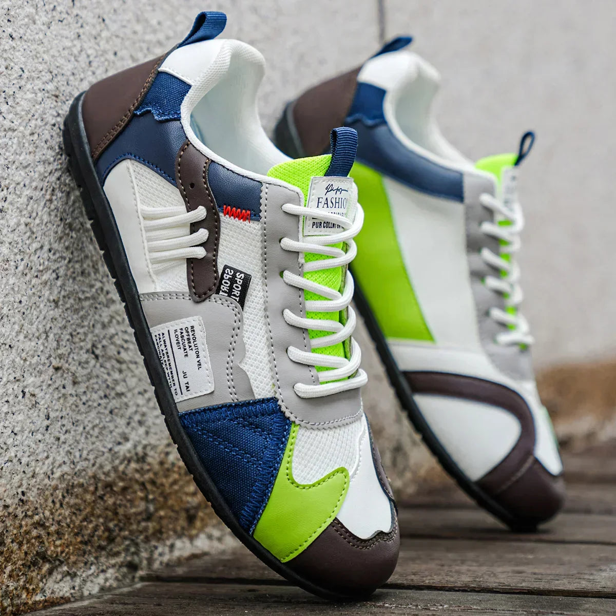 Colorful retro sneakers close-up: white, blue and neon green with white lace-up