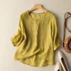 Yellow embroidered blouse with round neck, three-quarter sleeves, textured front detail