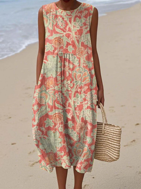 Floral midi dress, sleeveless with coral and green print, round neckline, relaxed fit