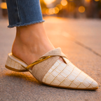 Cream gator-pattern slip-on shoe with beige fabric strap and gold accent block heel