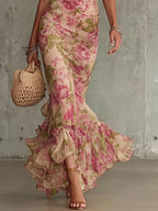 Pink rose-print maxi dress with ruffled hem and puff sleeves, side view