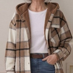 Brown-and-tan plaid hooded flannel shacket with sherpa lining and button placket