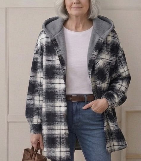 Black-and-white plaid hooded flannel shacket with sherpa-lined hood and button front
