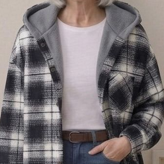 Black-and-white plaid hooded flannel shacket with sherpa hood lining and buttons