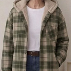 Green plaid hooded flannel shacket with tan sherpa trim and front button placket