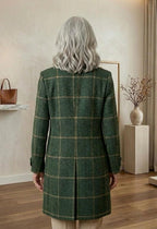 Women’s dark green plaid tweed coat, back view, long length and curved yoke