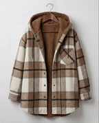 Brown-and-tan plaid hooded flannel shacket with sherpa hood lining and chest pocket