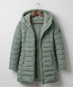 Olivia™ quilted A-line winter coat in light green with hood and zip front.
