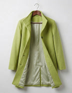 Light green long coat with notched lapels, button front, and lined interior.