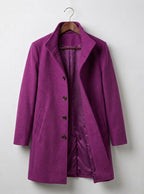 Purple long coat with notch lapels, dark buttons, and quilted inner lining.