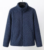 Navy teddy jacket with full-zip front and stand collar, long sleeves.