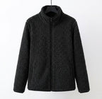 Black teddy jacket with full-zip front and stand collar, long sleeves.