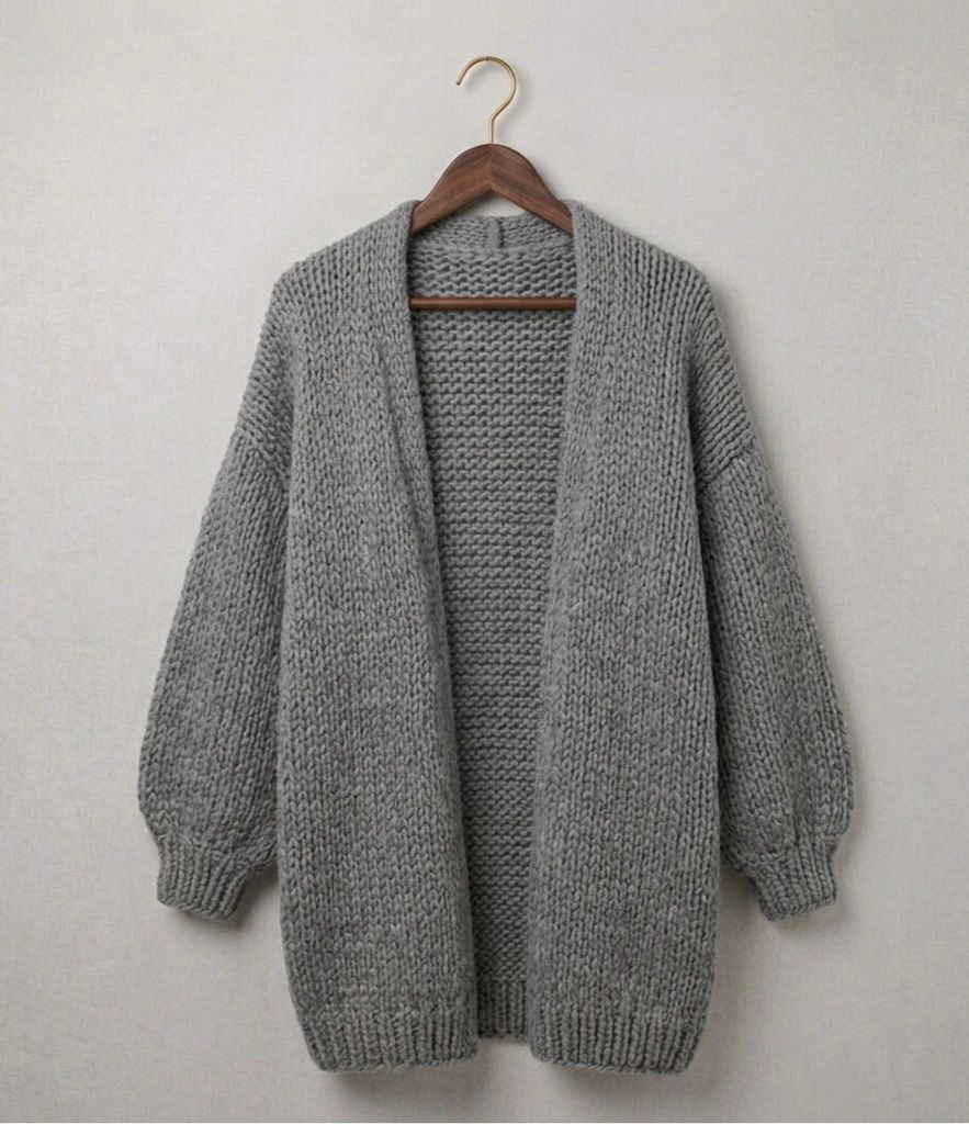 Grey relaxed knit cardigan with open front and ribbed cuffs
