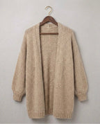 Beige relaxed knit cardigan with open front and ribbed hem