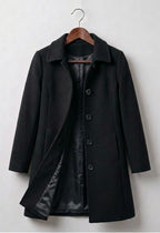 Black double-breasted coat with notched lapels and button front, long sleeves, lined interior