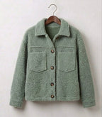 Green teddy jacket with button front, point collar, and two chest pockets