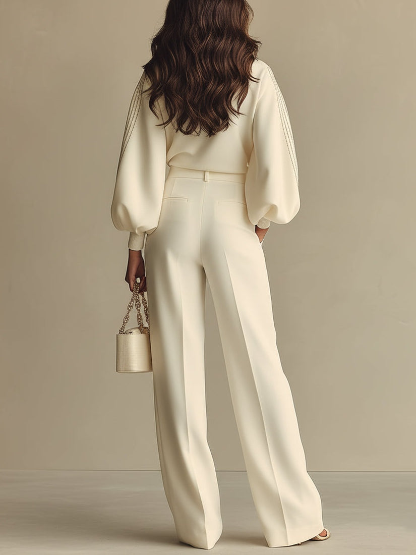 Ivory ribbed crewneck top and high-waisted wide-leg pants suit, back view