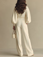 Ivory ribbed crewneck top and high-waisted wide-leg pants suit, back view