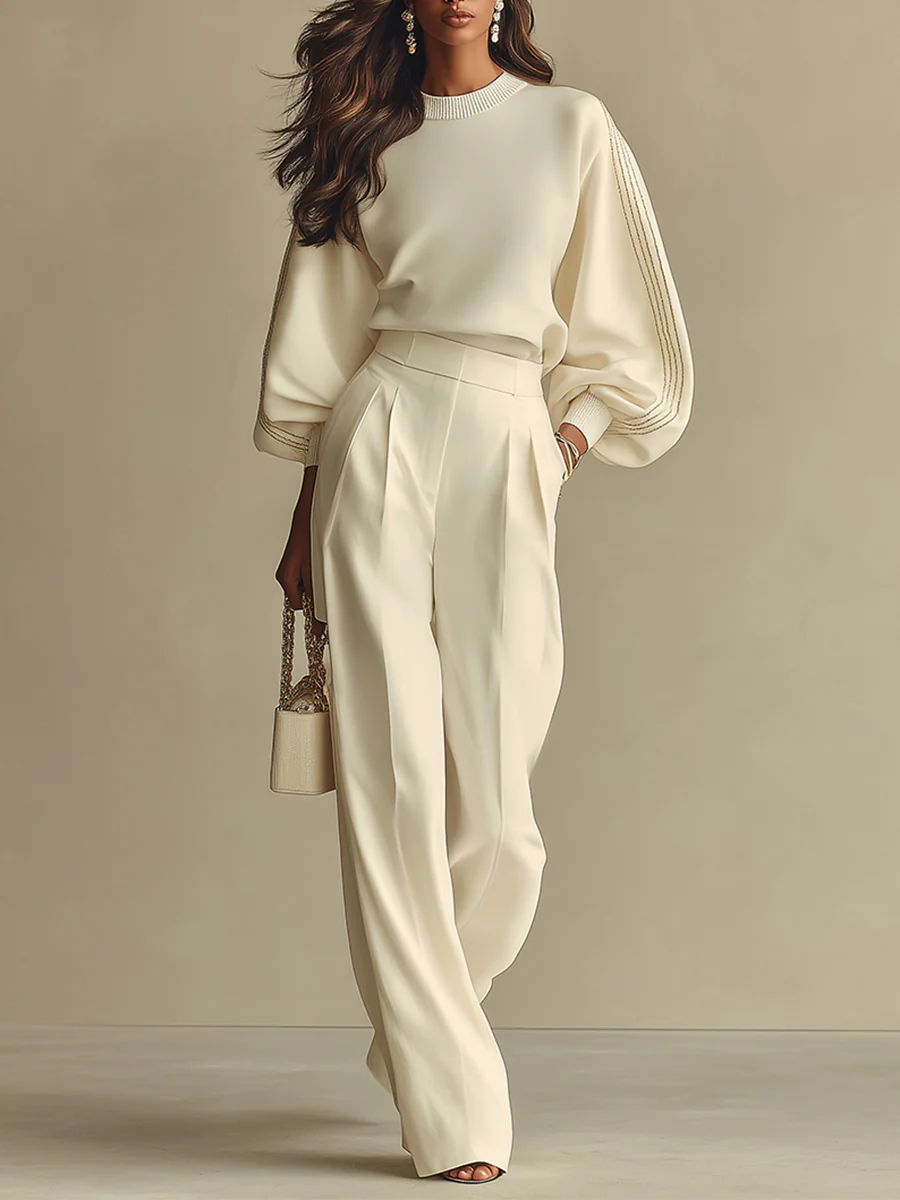 Ivory ribbed crewneck top and high-waisted wide-leg pants suit, full length view