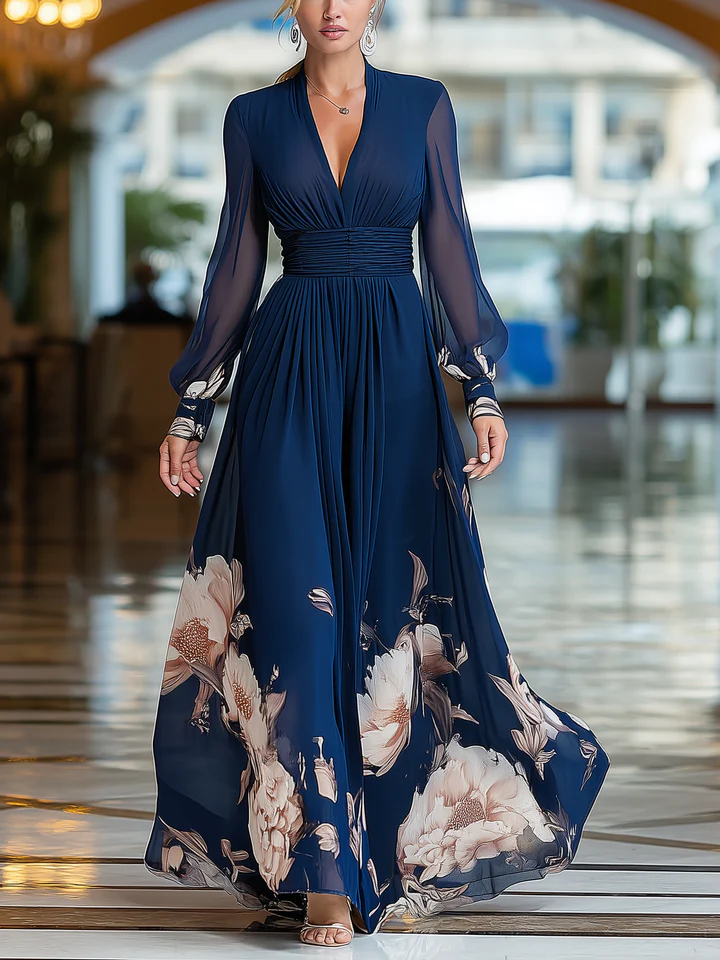Navy blue V-neck maxi dress with pleated waist, sheer tulle sleeves, floral print