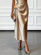 Champagne satin one-shoulder midi dress with draped skirt folds