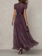 Purple long chiffon dress from back view, gathered waist and ruffled hem