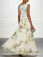 Floral sleeveless maxi dress, cream skirt with green botanical print and light blue waist panel