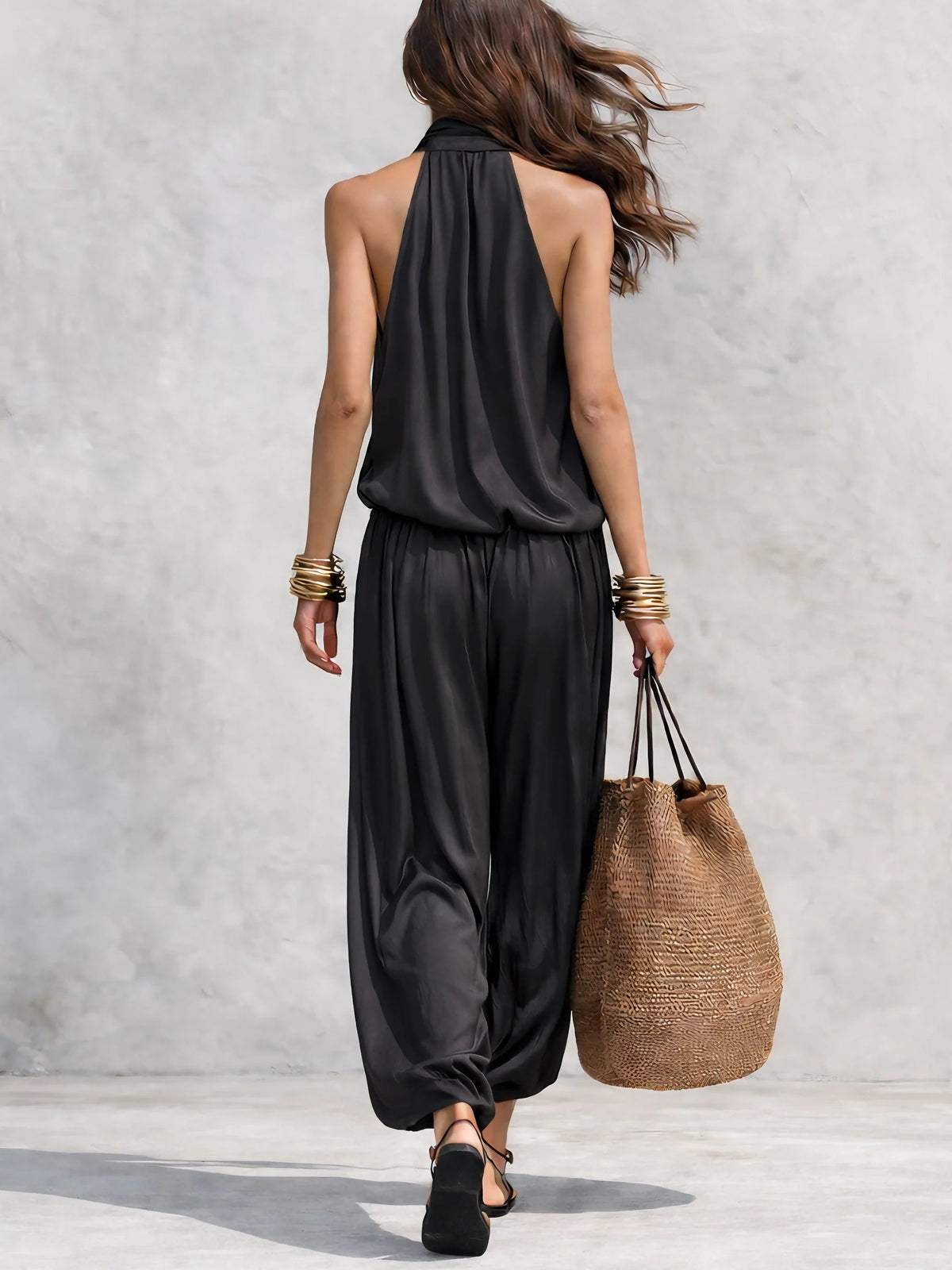 Two-piece set with back halter drape sleeveless top and black wide-leg pants