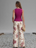 Rose pink sleeveless vest and floral wide-leg pants set, back view with fitted waist