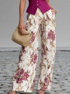 Floral wide-leg pants with rose pink sleeveless vest hem and gold button closure