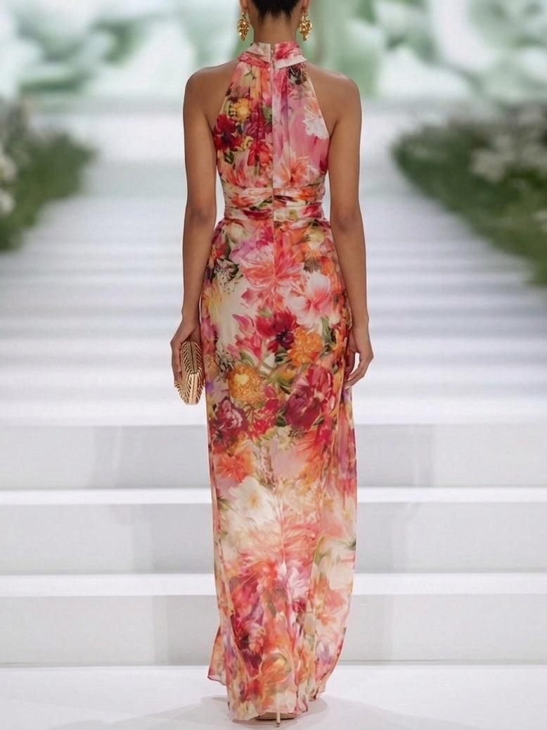 Sleeveless halter maxi dress with high neck and red-pink floral chiffon print