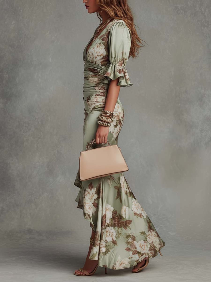 Sage green floral satin maxi dress, side view with ruched waist and asym ruffle hem
