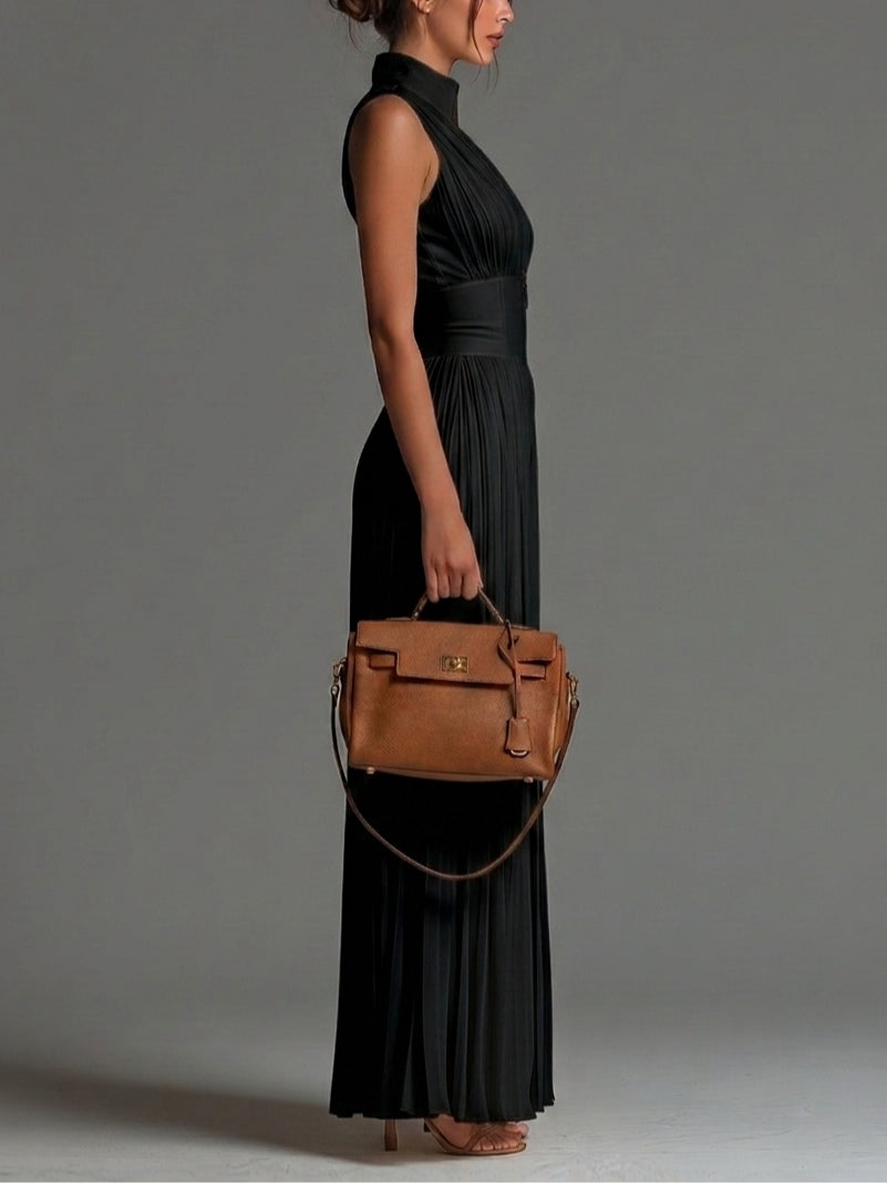 Black sleeveless V-neck zip-front pleated chiffon wide-leg jumpsuit, side view