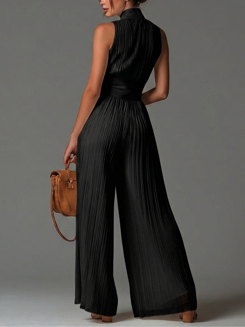 Black sleeveless V-neck zip-front pleated chiffon wide-leg jumpsuit, back/side view