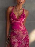 Fuchsia floral print ruched sleeveless bodycon dress with V-neck and side drape