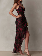 Black and red floral ruched dress with ruffle trim, sweetheart neckline, and high slit
