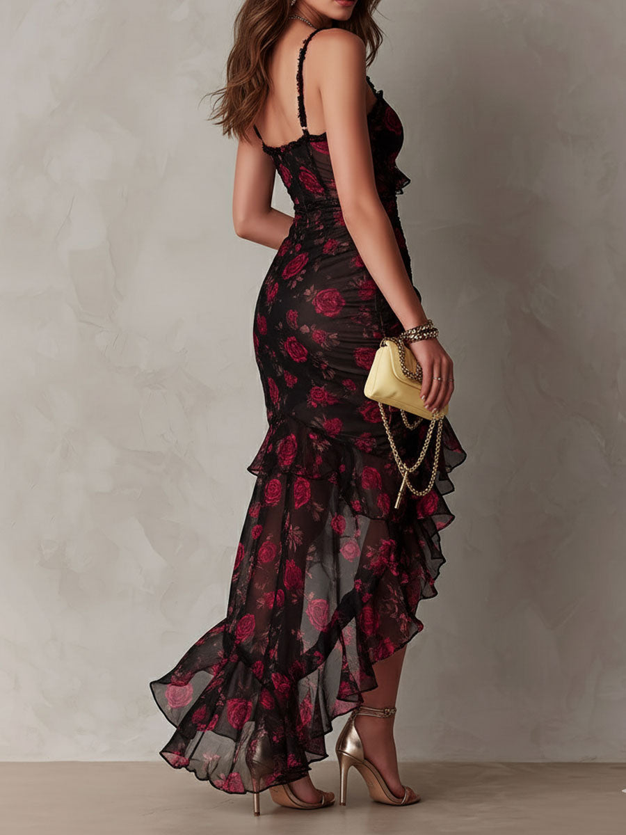 Black and red floral ruffle hem dress with ruched bodice and spaghetti straps, side view