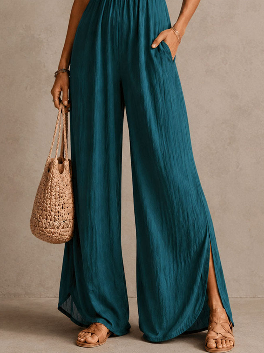 Blue-green wide-leg jumpsuit with side slit hem