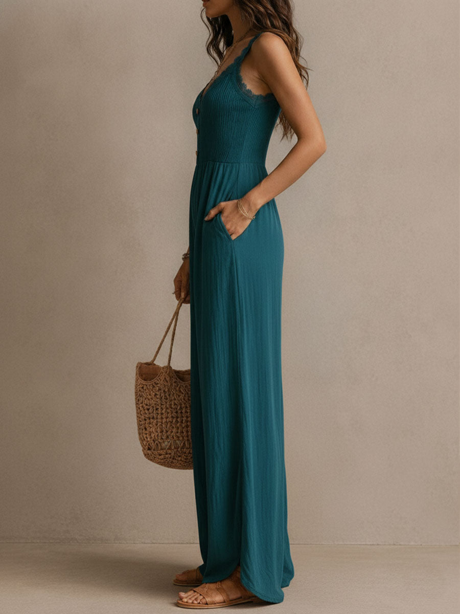 Blue-green sleeveless jumpsuit with scalloped lace V-neck and flowing wide legs