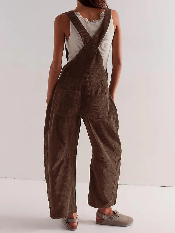 Brown corduroy sleeveless jumpsuit with cross-back straps and wide legs