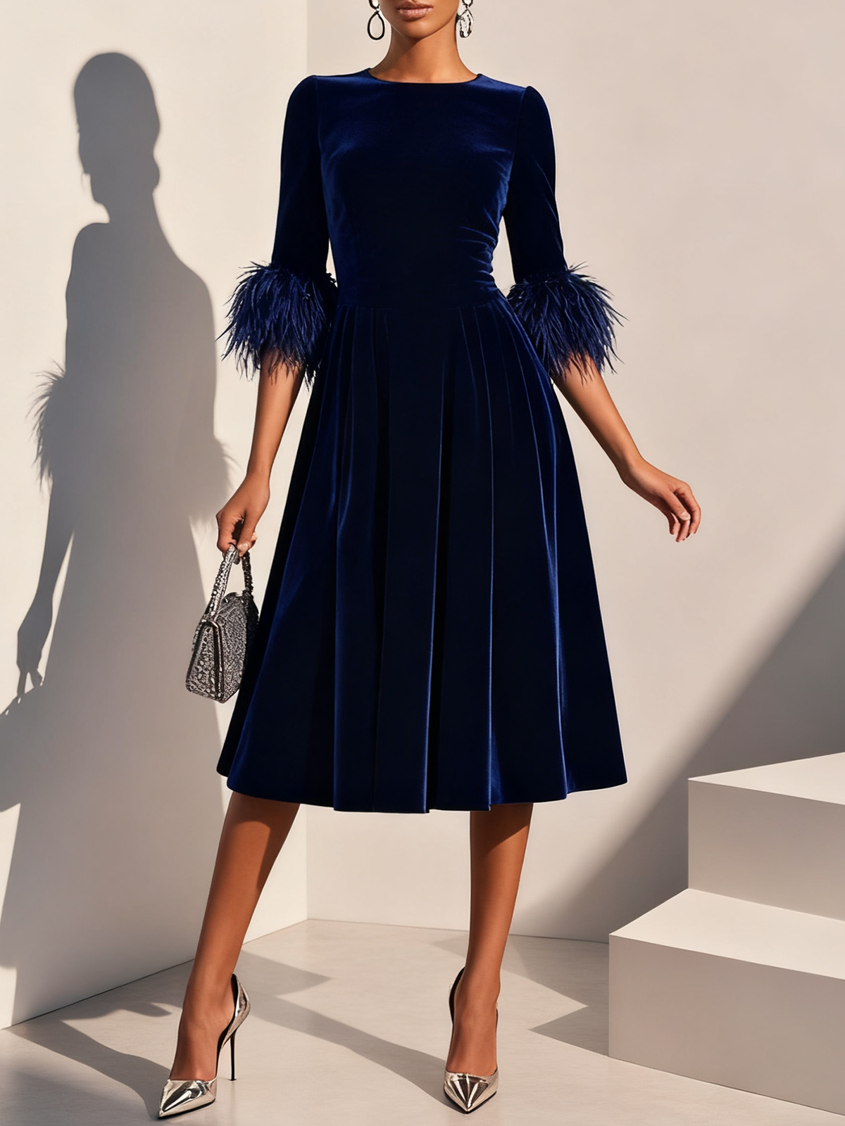 Dark blue velvet midi A-line dress with round neck and feather-trimmed sleeves